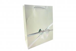 L1019 Пакет ЛЮКС Бантик и лента 25x32x12 см. микс 4 дизайна (360/12шт).5638/745-uds