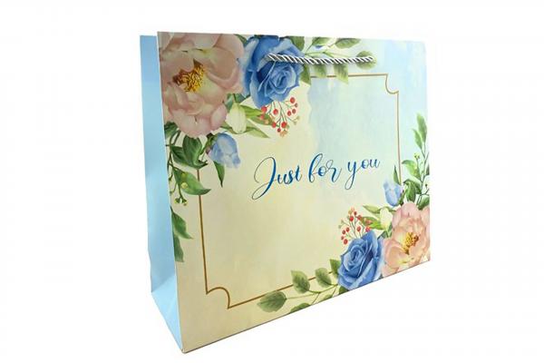 L255 Пакет ЛЮКС с бантом 26x32x11 см. микс 4 дизайна (360/12шт).7889/895-uds