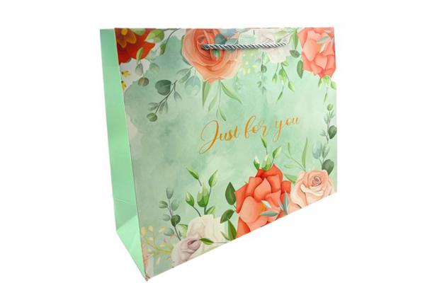 L255 Пакет ЛЮКС с бантом 26x32x11 см. микс 4 дизайна (360/12шт).7889/895-uds